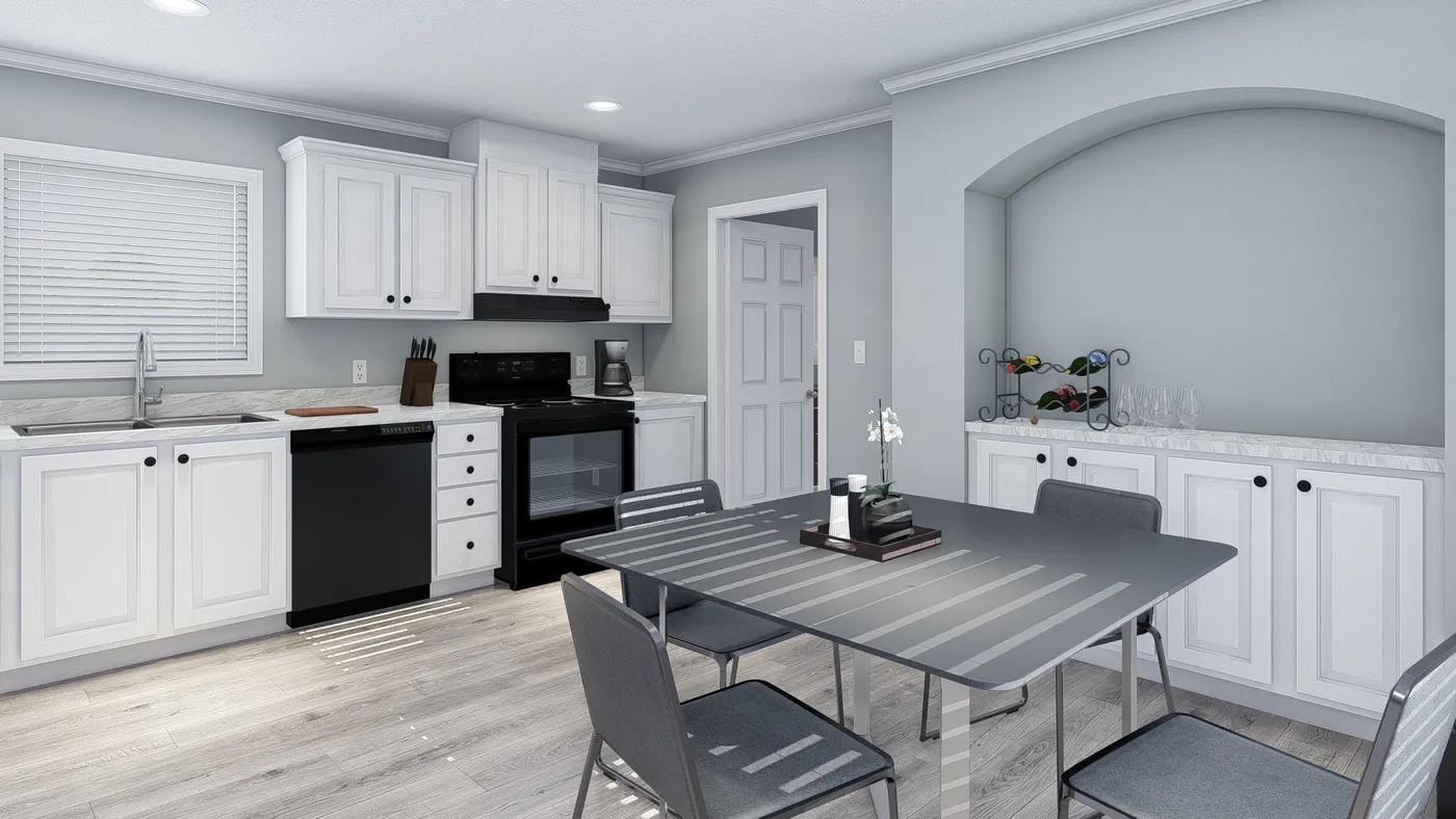 The 101  ADVANTAGE PLUS 7616 Dining Area. This Manufactured Mobile Home features 3 bedrooms and 2 baths.