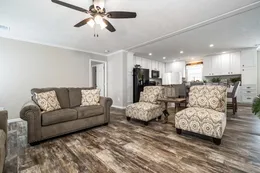 The THE JEFFERSON Living Room. This Manufactured Mobile Home features 3 bedrooms and 3 baths.