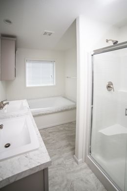 The CYAN Master Bathroom. This Manufactured Mobile Home features 2 bedrooms and 2 baths.