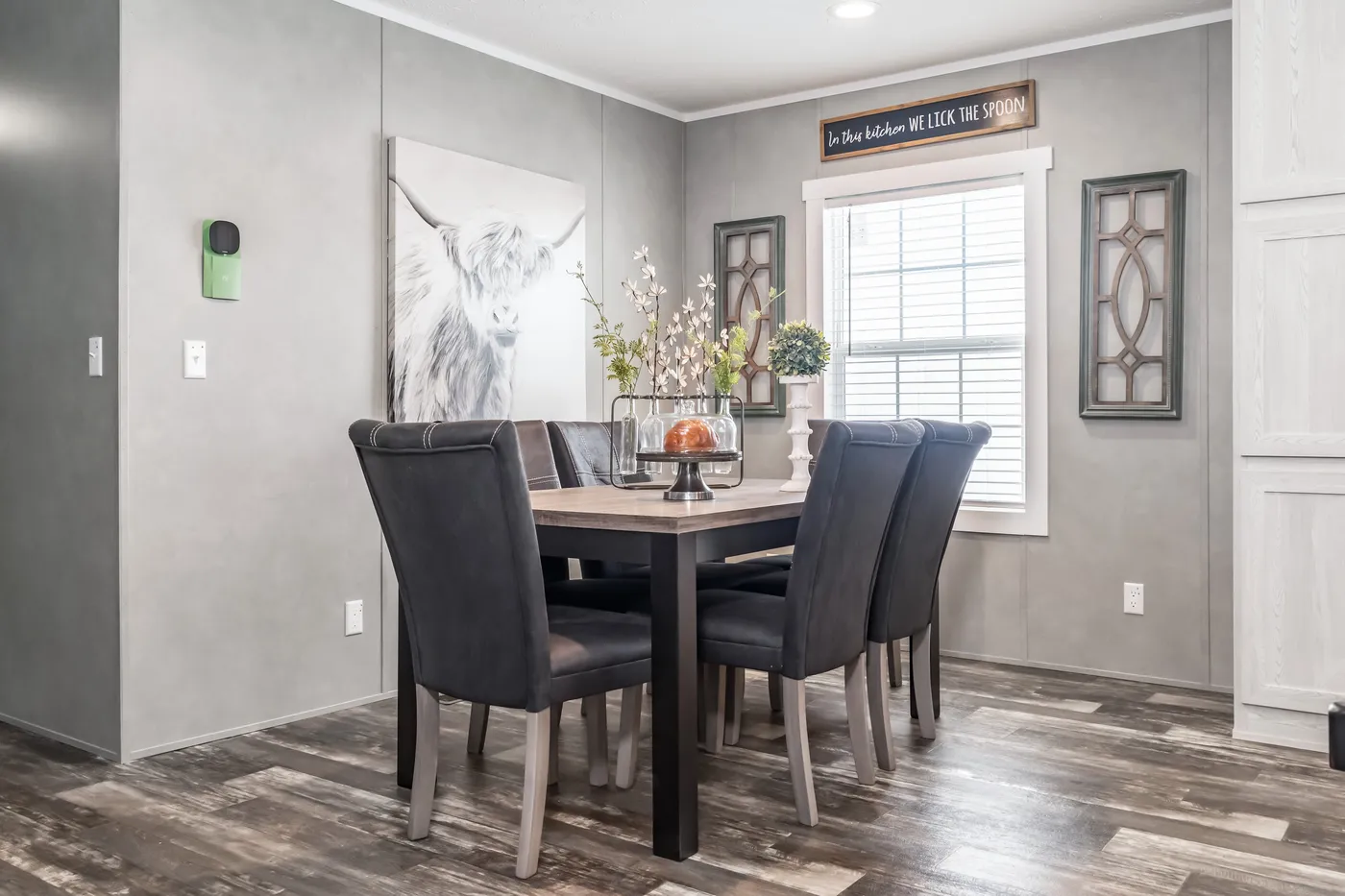 The ULTRA BREEZE 52 Dining Area. This Manufactured Mobile Home features 3 bedrooms and 2 baths.