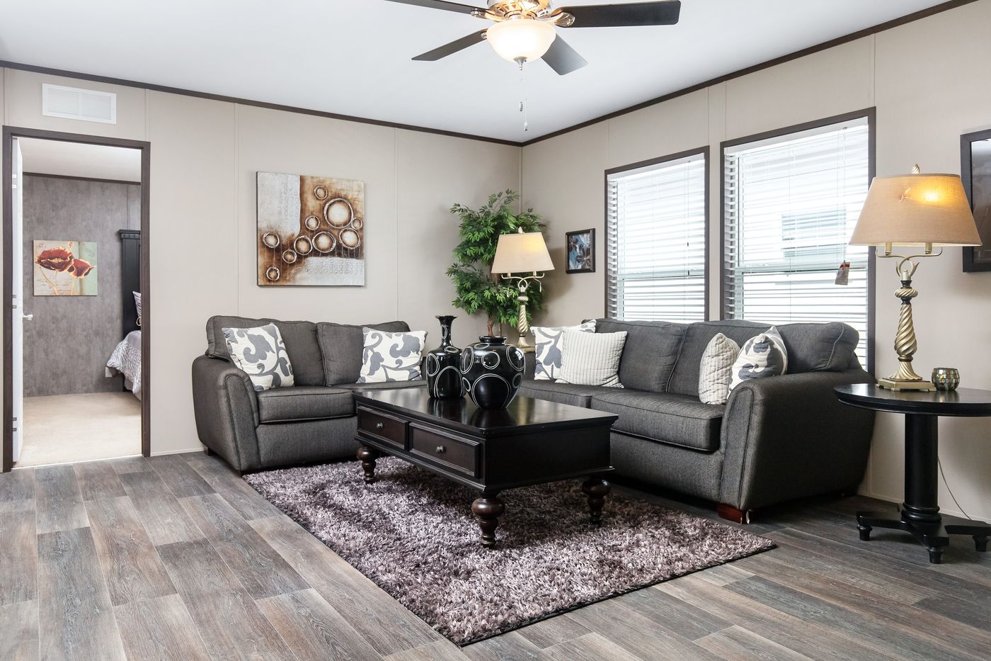 The PT 78 Living Room. This Manufactured Mobile Home features 3 bedrooms and 2 baths.