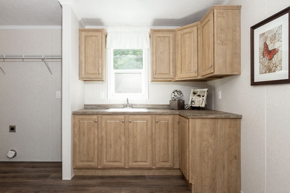 The SHEER ELM Utility Room. This Manufactured Mobile Home features 3 bedrooms and 2 baths.