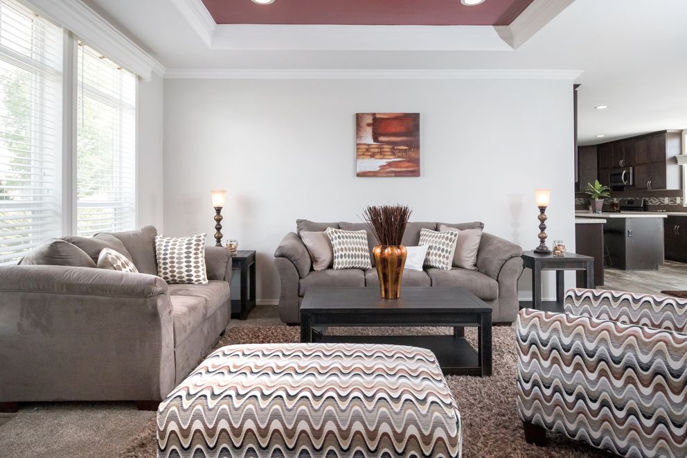 The ENCHANTMENT 3070A Family Room. This Manufactured Mobile Home features 3 bedrooms and 2 baths.