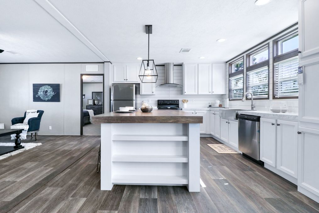 The ABSOLUTE VALUE Kitchen. This Manufactured Mobile Home features 4 bedrooms and 2 baths.