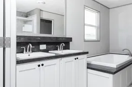 The DIAMOND Primary Bathroom. This Manufactured Mobile Home features 3 bedrooms and 2 baths.