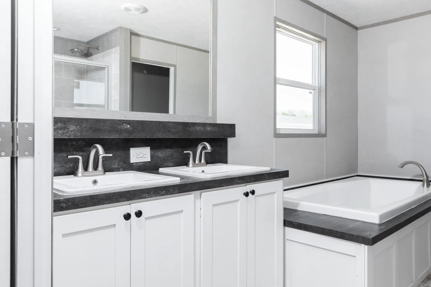 The DIAMOND Primary Bathroom. This Manufactured Mobile Home features 3 bedrooms and 2 baths.