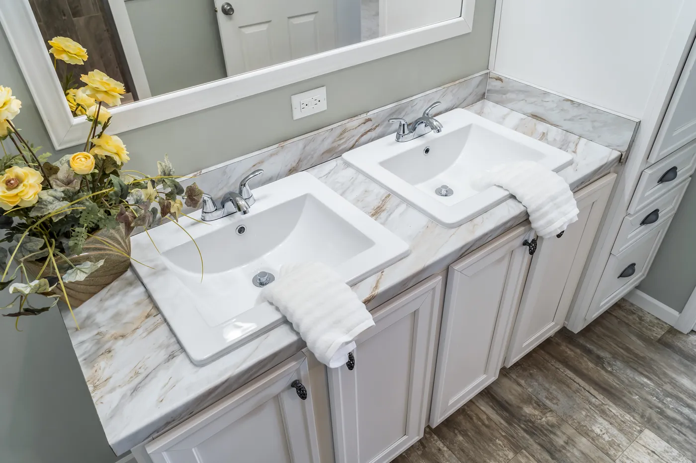 The THE INGRAM Primary Bathroom. This Manufactured Mobile Home features 3 bedrooms and 2 baths.