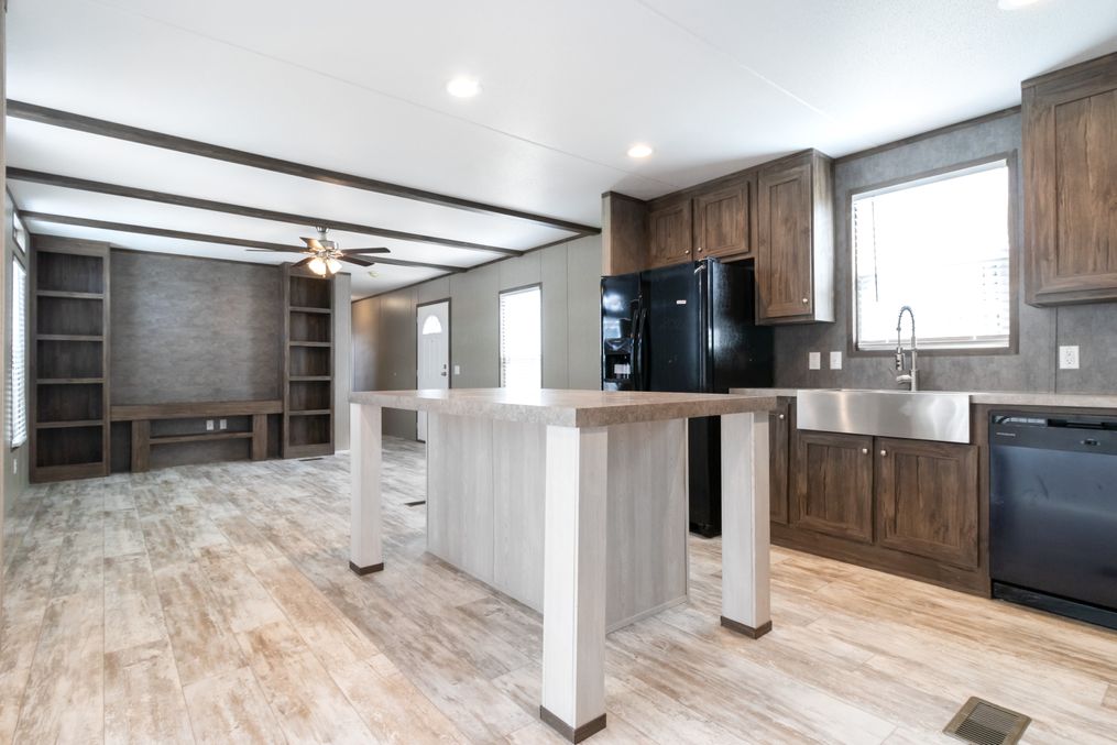 The ANNIVERSARY 16763I Kitchen. This Manufactured Mobile Home features 3 bedrooms and 2 baths.