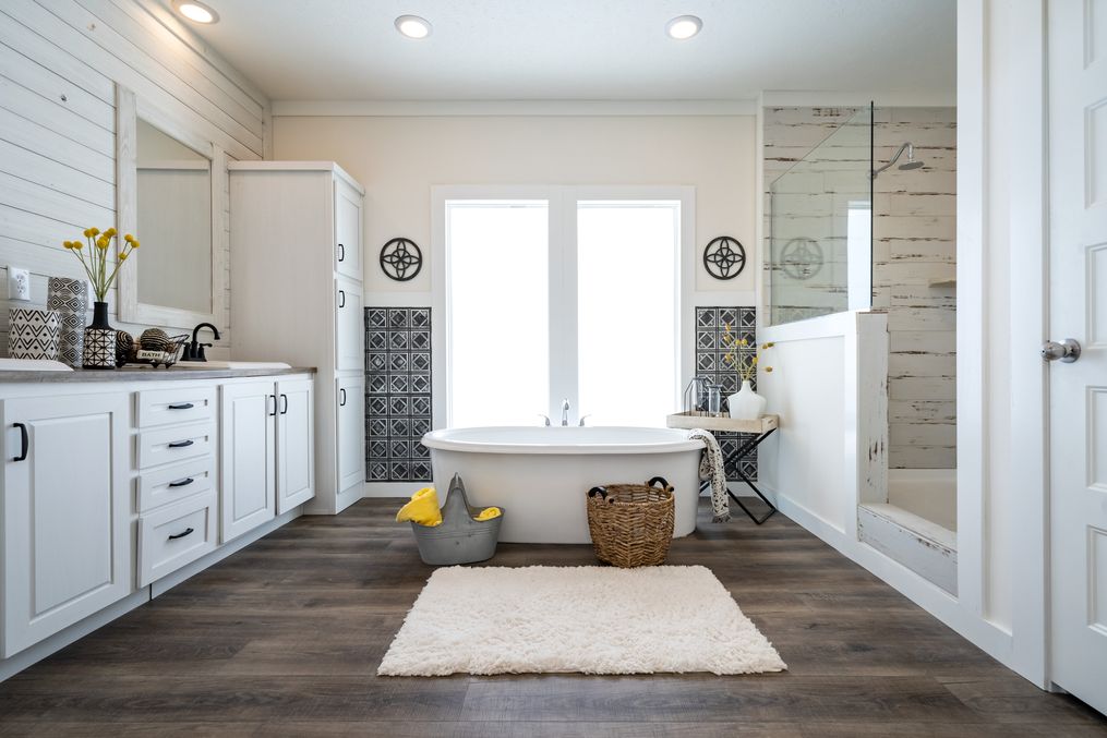 The 1434 CAROLINA "SOUTHERN BELLE" Master Bathroom. This Manufactured Mobile Home features 3 bedrooms and 2 baths.