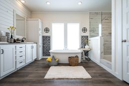 The 1434 CAROLINA "SOUTHERN BELLE" Primary Bathroom. This Manufactured Mobile Home features 3 bedrooms and 2 baths.