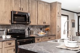 The BOUJEE Kitchen. This Manufactured Mobile Home features 3 bedrooms and 2 baths.