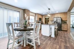 The AMELIA Dining Area. This Manufactured Mobile Home features 4 bedrooms and 2 baths.