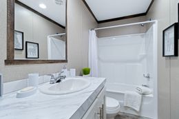 The THE MAVERICK Guest Bathroom. This Manufactured Mobile Home features 4 bedrooms and 2 baths.