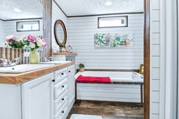 The ANNIVERSARY TV HOME Exterior. This Manufactured Mobile Home features 3 bedrooms and 2 baths.