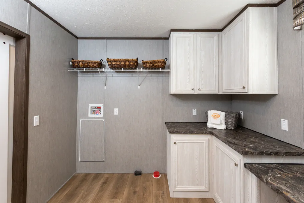 The THE HAMPTON BAY Utility Room. This Manufactured Mobile Home features 3 bedrooms and 2 baths.