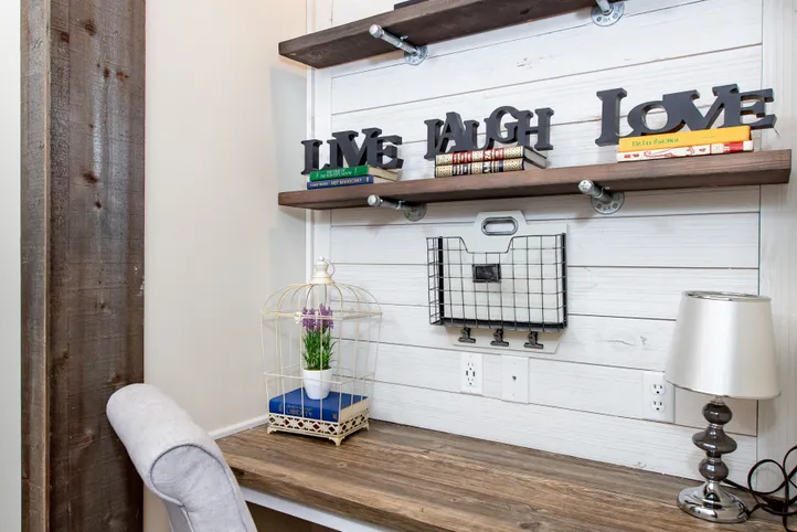 The SOUTHERN CHARM Study Nook. This Manufactured Mobile Home features 3 bedrooms and 2 baths.