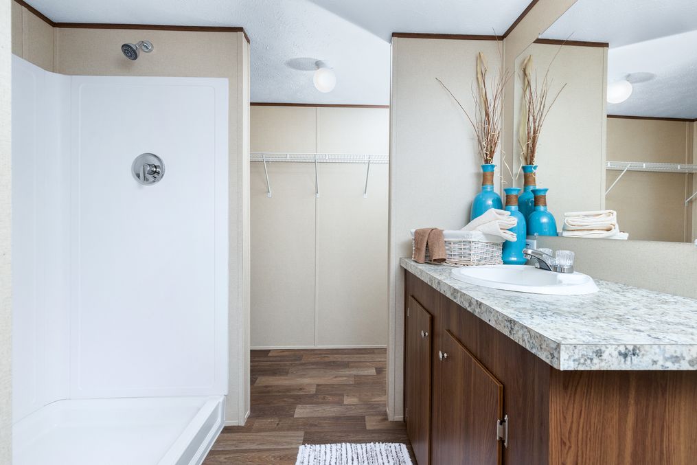 The VICTORY PLUS Primary Bathroom. This Manufactured Mobile Home features 3 bedrooms and 2 baths.