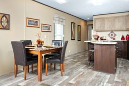 The THE SHERMAN Dining Area. This Manufactured Mobile Home features 3 bedrooms and 2 baths.