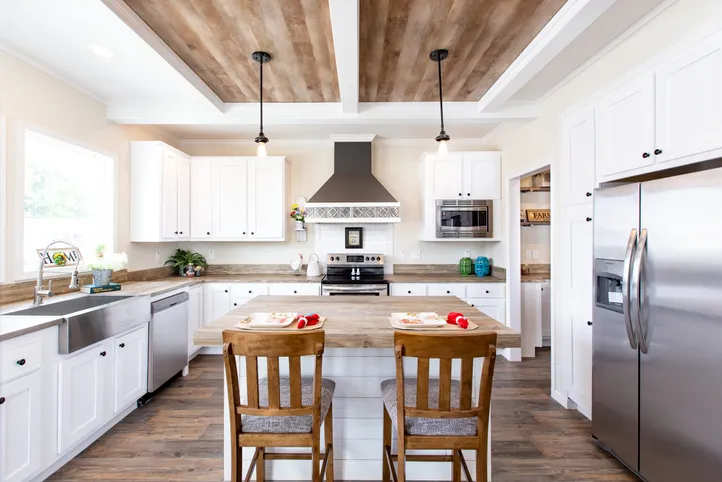 The SOUTHERN CHARM Kitchen. This Manufactured Mobile Home features 3 bedrooms and 2 baths.