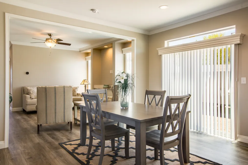 The EDGEWOOD Dining Area. This Manufactured Mobile Home features 3 bedrooms and 2 baths.