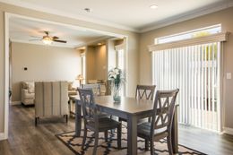 The EDGEWOOD Dining Area. This Manufactured Mobile Home features 3 bedrooms and 2 baths.