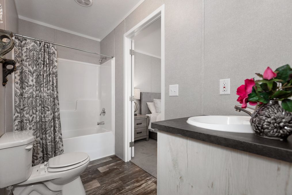 The SAPPHIRE Primary Bathroom. This Manufactured Mobile Home features 3 bedrooms and 2 baths.