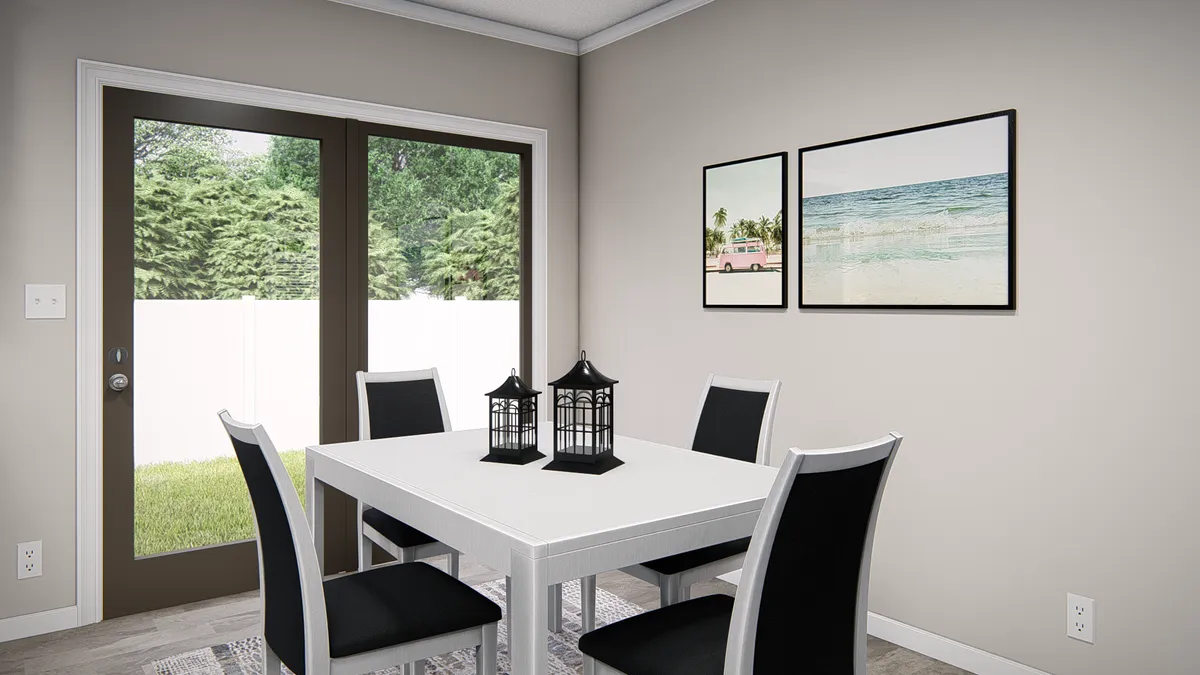 The THE RIVIERA Dining Area. This Manufactured Mobile Home features 4 bedrooms and 2 baths.