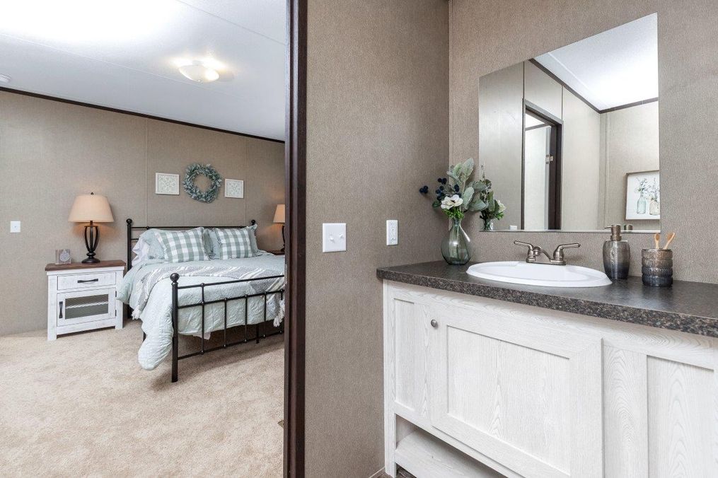 The CHALLENGER 16763B Master Bathroom. This Manufactured Mobile Home features 3 bedrooms and 2 baths.
