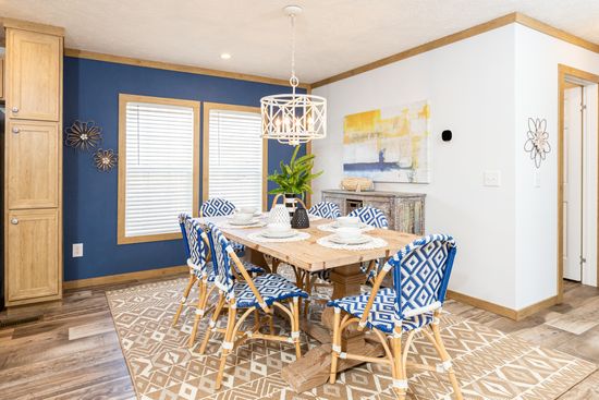 The THE KIMMEL Dining Area. This Manufactured Mobile Home features 3 bedrooms and 2 baths.