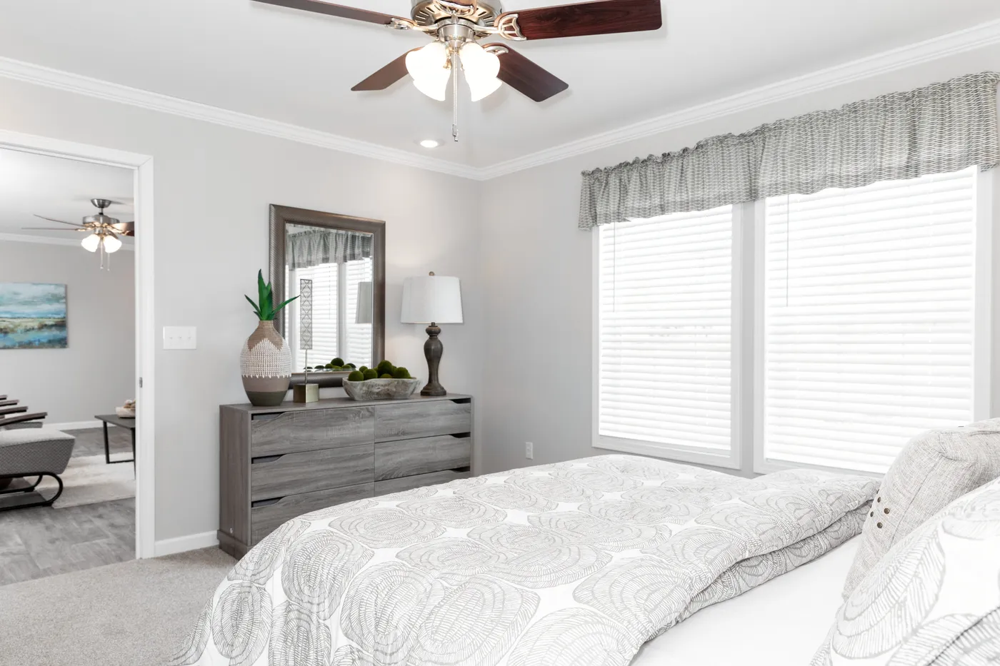 The THE VILLETTE Primary Bedroom. This Manufactured Mobile Home features 3 bedrooms and 2 baths.