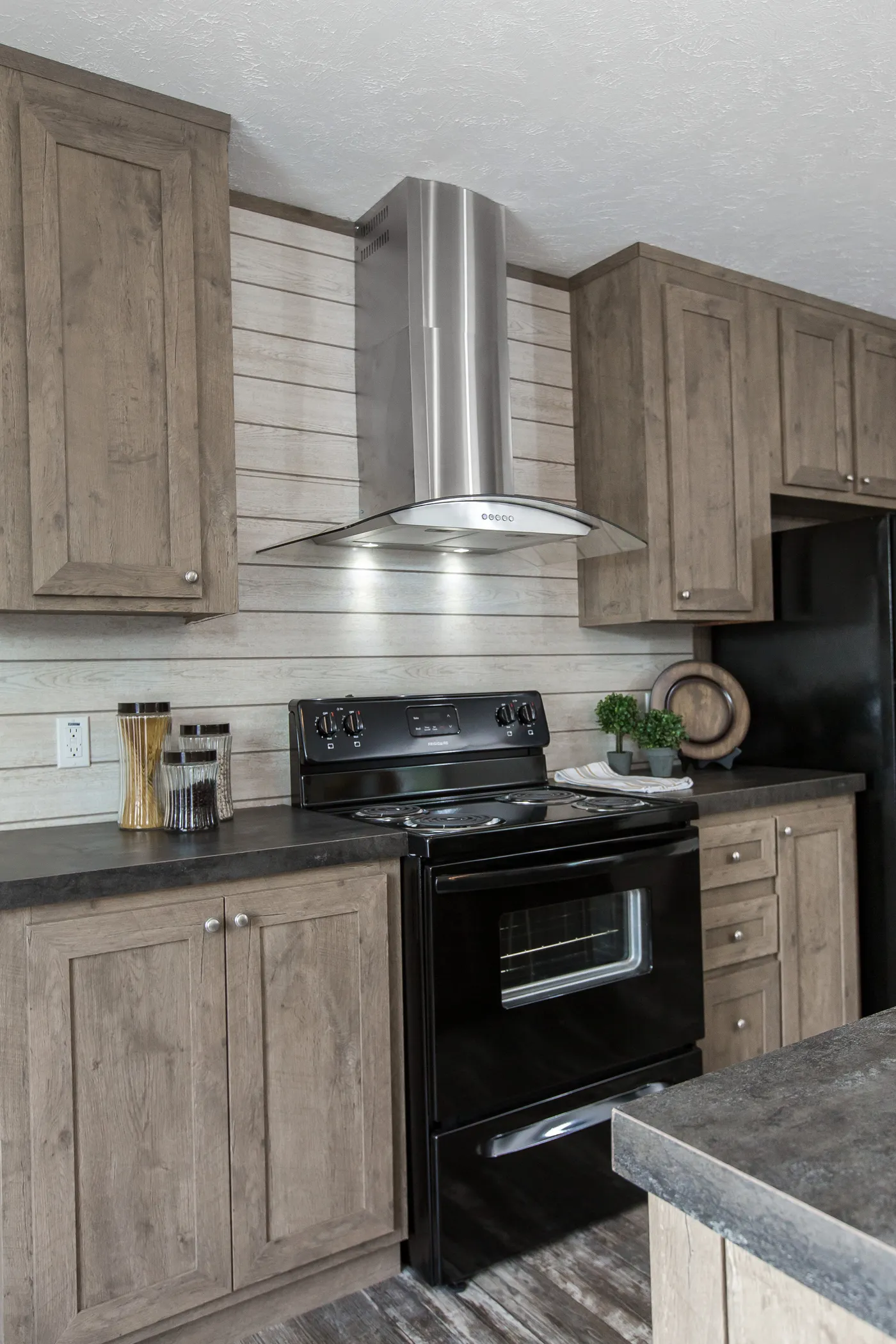 The THE BREEZE Kitchen. This Manufactured Mobile Home features 3 bedrooms and 2 baths.