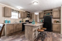 The THE EAGLE 60 Kitchen. This Manufactured Mobile Home features 3 bedrooms and 2 baths.