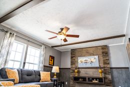 The TRADITION 2868B Living Room. This Manufactured Mobile Home features 4 bedrooms and 2 baths.