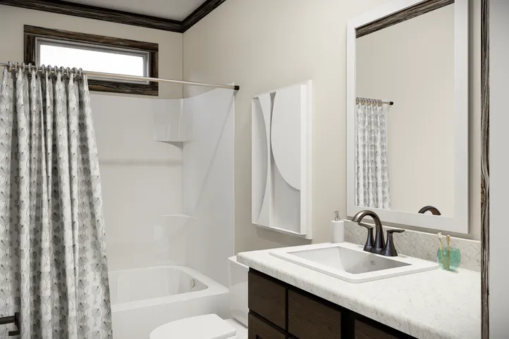 The THE ANDERSON II Guest Bathroom. This Manufactured Mobile Home features 3 bedrooms and 2 baths.