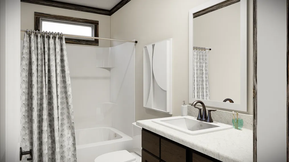 The THE ANDERSON II Guest Bathroom. This Manufactured Mobile Home features 3 bedrooms and 2 baths.
