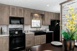 The THE WALSH Kitchen. This Manufactured Mobile Home features 3 bedrooms and 2 baths.