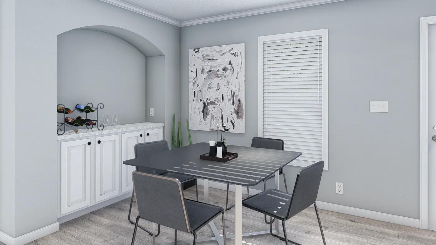 The 101  ADVANTAGE PLUS 7616 Dining Area. This Manufactured Mobile Home features 3 bedrooms and 2 baths.