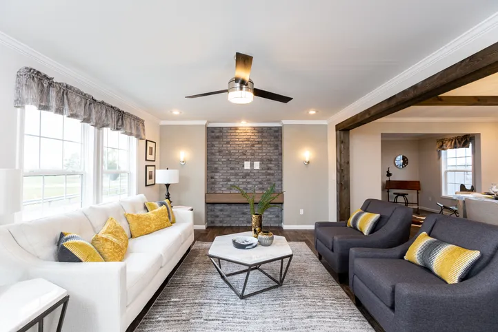 The THE FREEDOM SOHO Living Room. This Manufactured Mobile Home features 3 bedrooms and 2 baths.