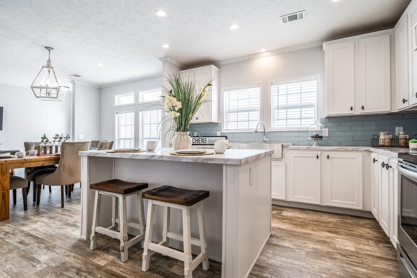The THE INGRAM Kitchen. This Manufactured Mobile Home features 3 bedrooms and 2 baths.