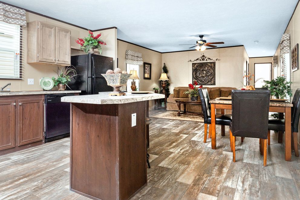 The THE SHERMAN Kitchen. This Manufactured Mobile Home features 3 bedrooms and 2 baths.