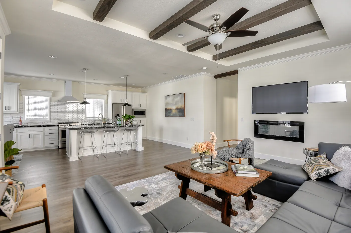 The CORONADO 2458F Living Room. This Manufactured Mobile Home features 3 bedrooms and 3 baths.