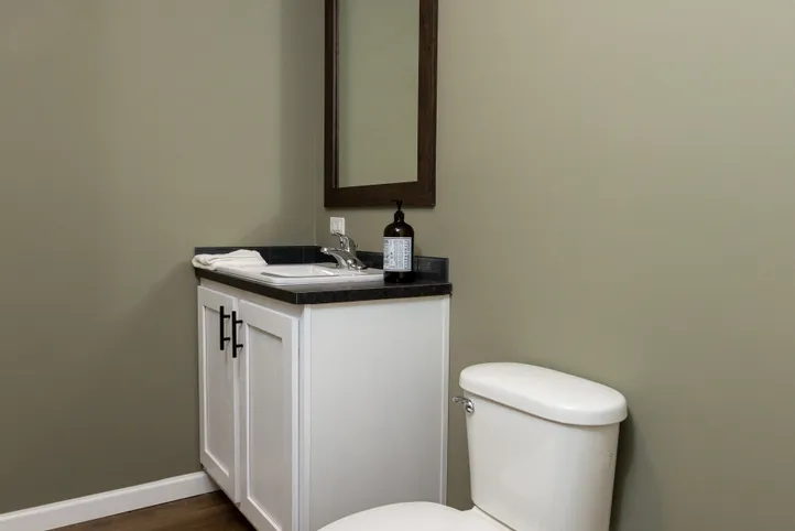 The KEENELAND Guest Bathroom. This Manufactured Mobile Home features 3 bedrooms and 2 baths.