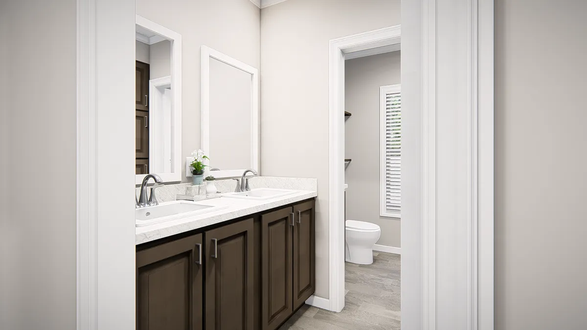 The THE RIVIERA Guest Bathroom. This Manufactured Mobile Home features 4 bedrooms and 2 baths.