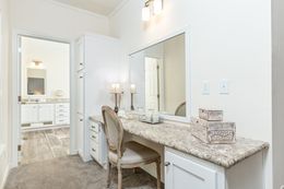 The 1714 HERITAGE Primary Bedroom. This Manufactured Mobile Home features 3 bedrooms and 2 baths.