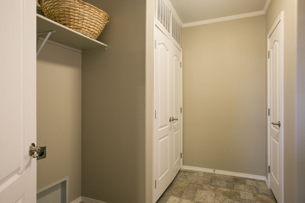 The TRANQUILITY TR3062A Kitchen. This Manufactured Mobile Home features 3 bedrooms and 2 baths.