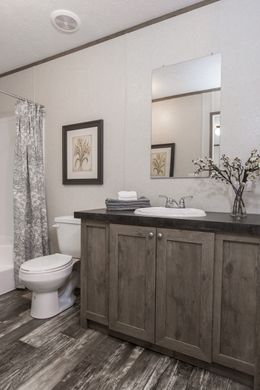 The THE BREEZE I Master Bathroom. This Manufactured Mobile Home features 3 bedrooms and 2 baths.