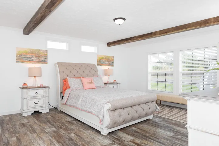The THE LULABELLE Primary Bedroom. This Manufactured Mobile Home features 4 bedrooms and 3 baths.