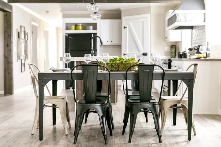 The FREEDOM FARM HOUSE  32X60 Dining Area. This Manufactured Mobile Home features 3 bedrooms and 2 baths.