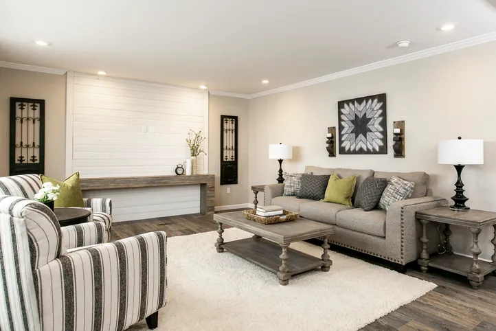 The FREEDOM FARM HOUSE  32X60 Living Room. This Manufactured Mobile Home features 3 bedrooms and 2 baths.