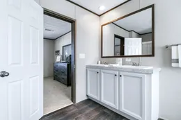 The ABSOLUTE VALUE Primary Bathroom. This Manufactured Mobile Home features 4 bedrooms and 2 baths.